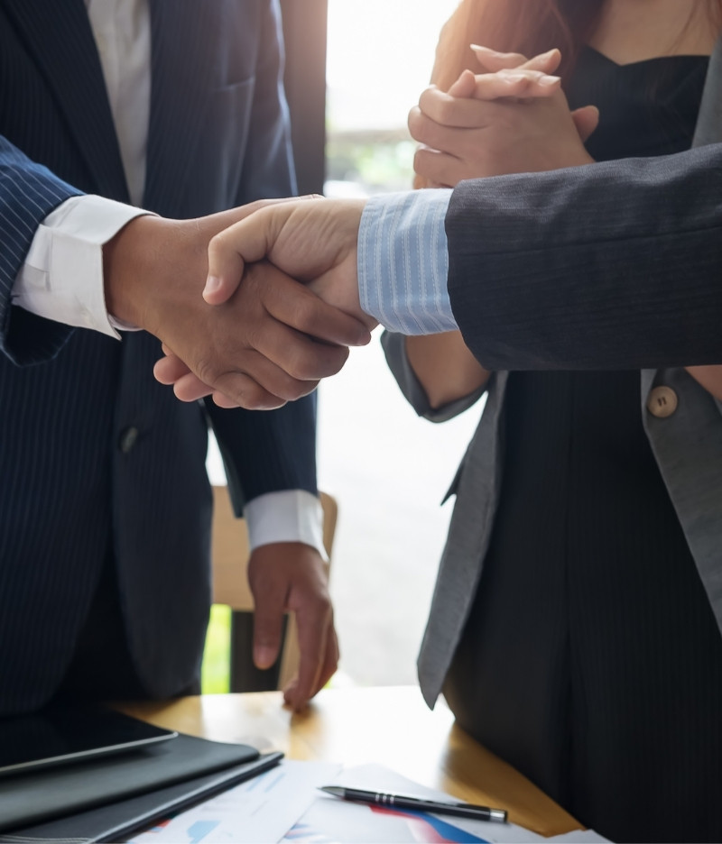 IT Consultants Shaking Hands With Eachother