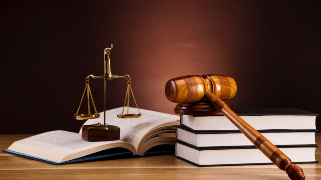 Law gavel with scales and books representing legal services