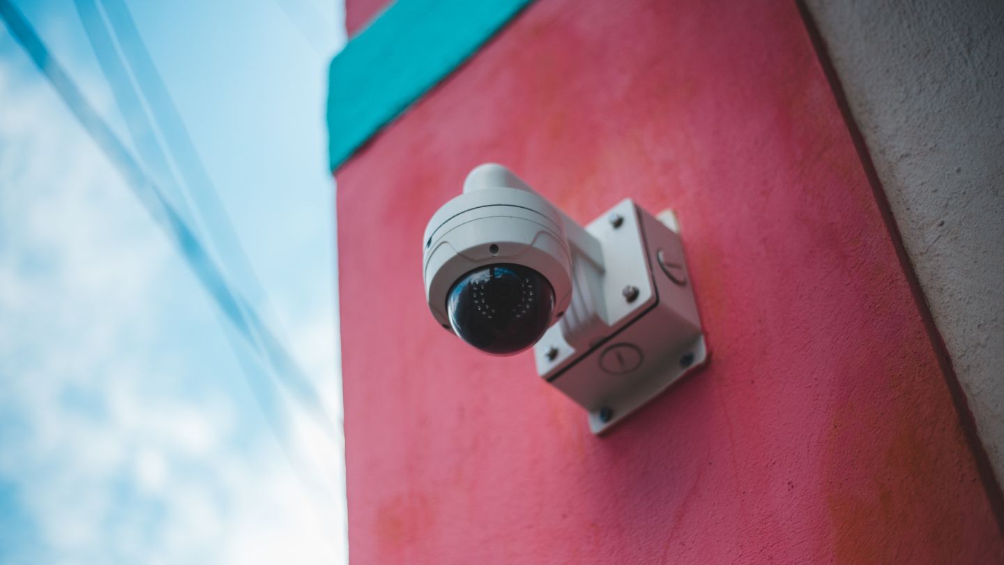 Outdoor Dome Security Camera On Wall