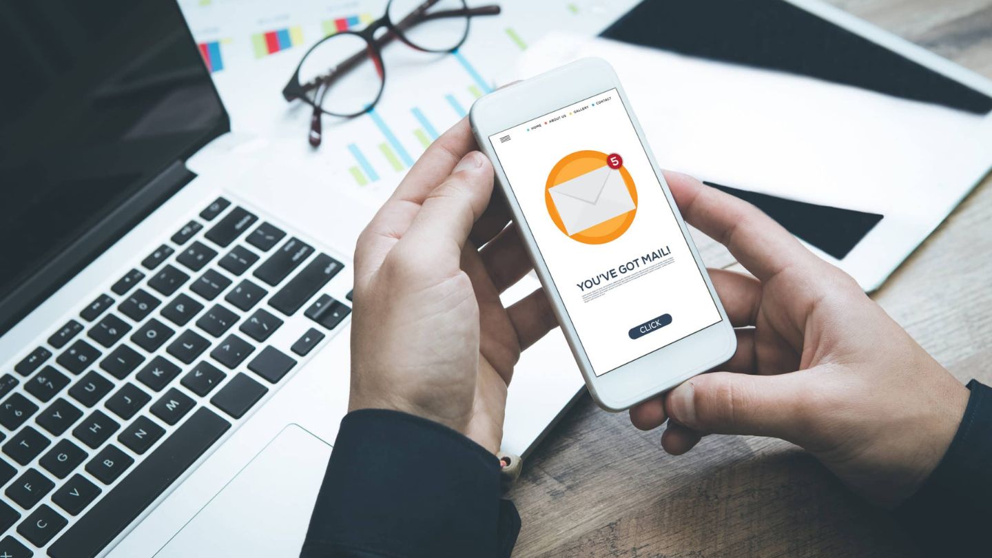 Person Checking Suspicious Email On Smartphone